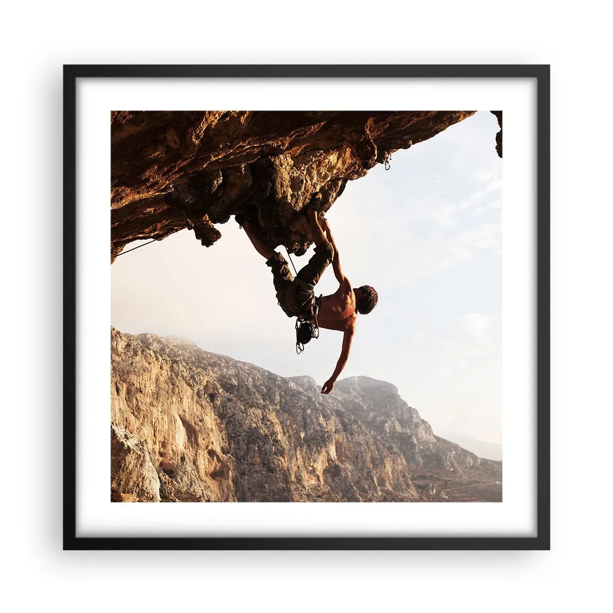 Plakát v černém rámu - Svět smrsknutý v ruce na sesuvu balvanu - 50x50 cm