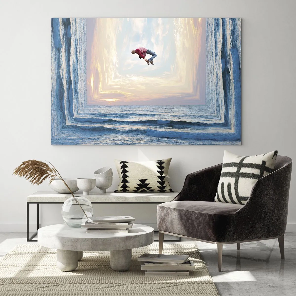Obraz na skle - Muž skákající přes moře v surrealistickém záběru - 70x50cm - Do jiné dimenze - Moderní nástěnná dekorace do obývacího pokoje a ložnice ARTTOR