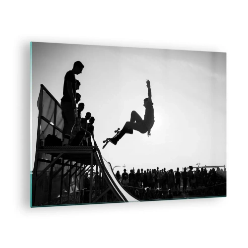 Obraz na skle - Černobílý bruslař ve vzduchu - 70x50cm - Hrdinové a diváci - Moderní nástěnná dekorace do obývacího pokoje a ložnice ARTTOR