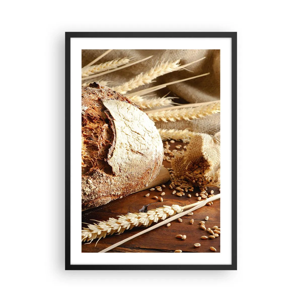 Plakát v černém rámu - Chléb na dřevěném stole s klasy pšenice - 50x70cm - Chutný, voňavý, křupavý - Moderní nástěnná dekorace do obývacího pokoje a ložnice ARTTOR