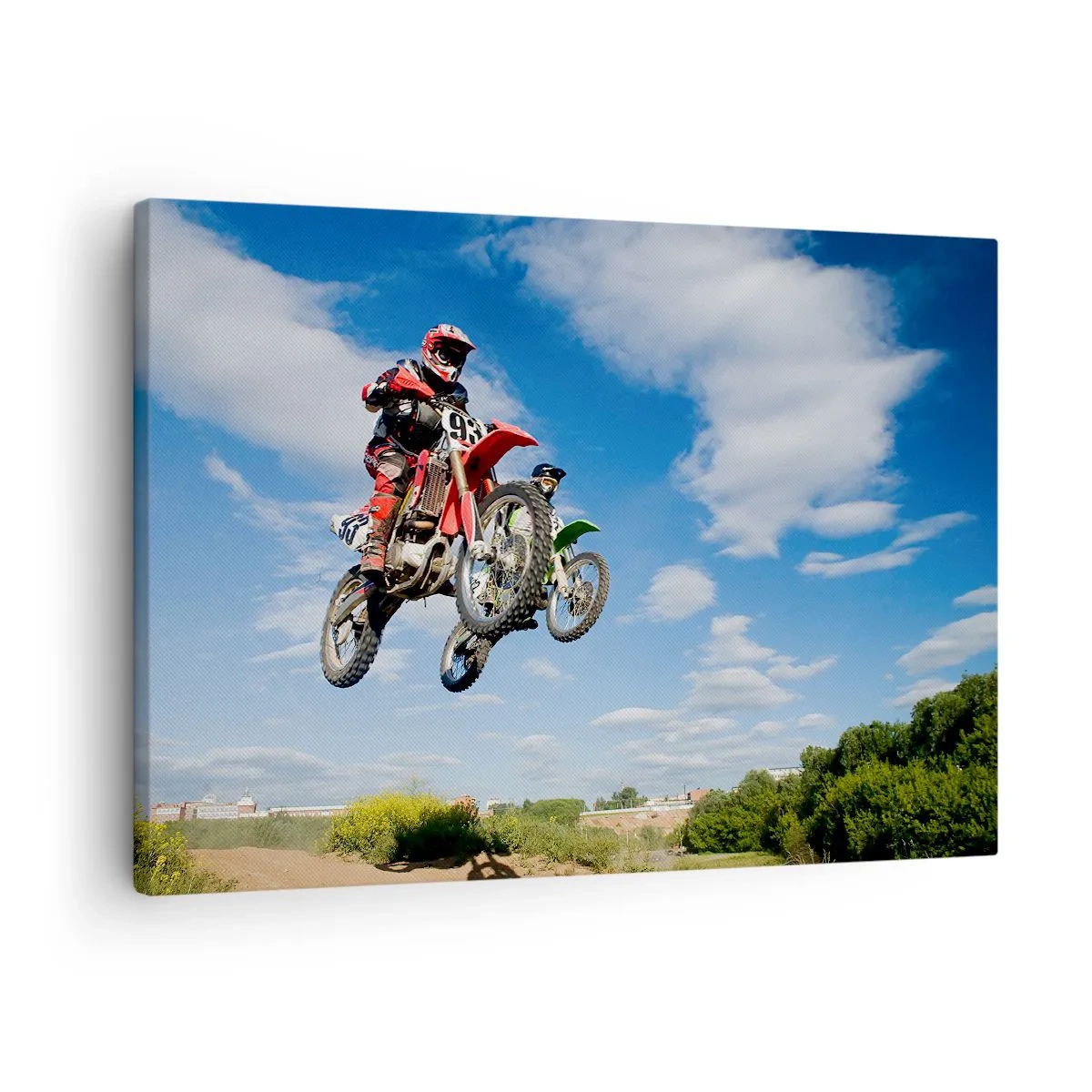 Obraz na plátně - Jezdci na motokrosových motorkách ve vzduchu během skoku - 70x50cm - Skok z oblak - Moderní nástěnná dekorace do obývacího pokoje a ložnice ARTTOR