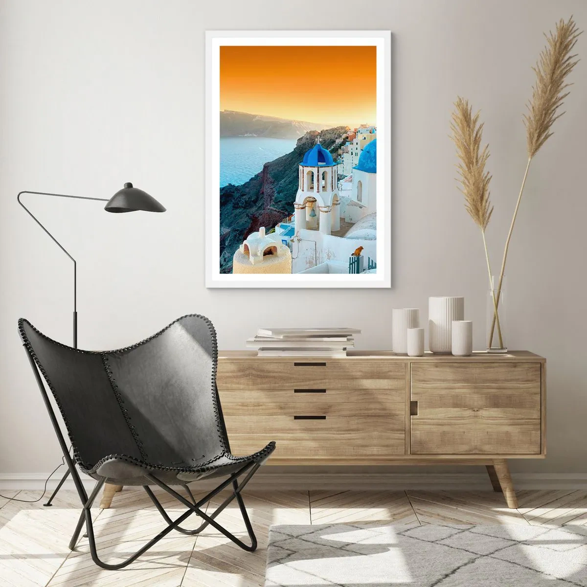 Plakát v bílém rámu - Santorini - přitulené ke skalám - 40x50 cm