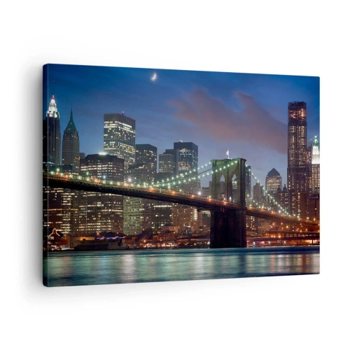 Obraz na plátně - Newyorský most v noci s osvětlenými budovami - 70x50cm - Rozjařená noc - Moderní nástěnná dekorace do obývacího pokoje a ložnice ARTTOR