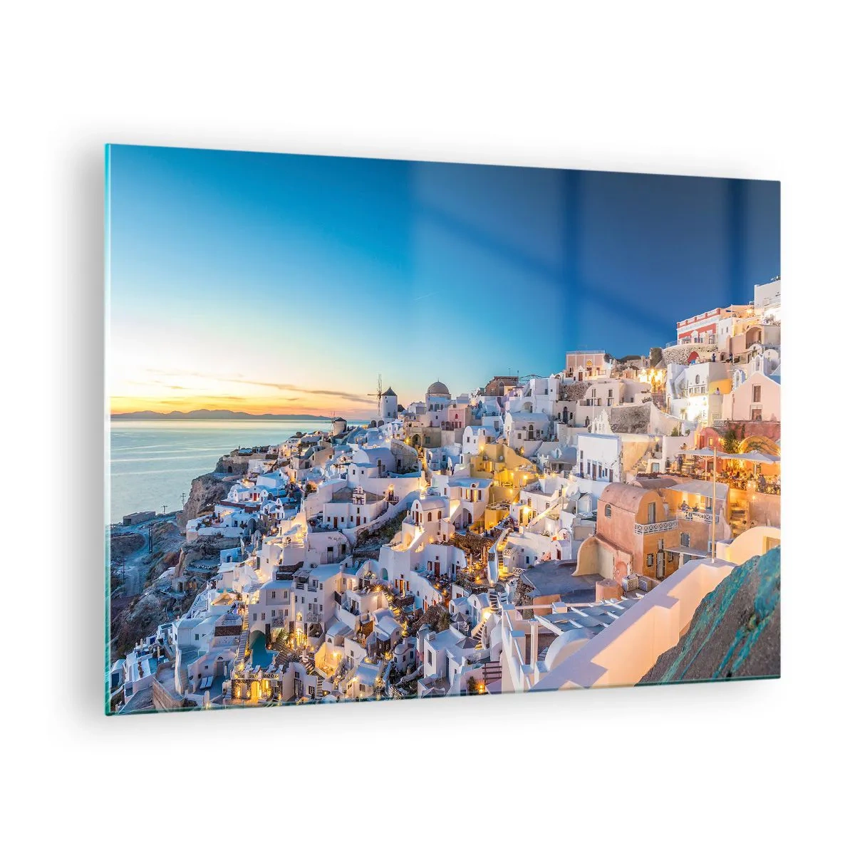 Obraz na skle - Panorama Santorini při západu slunce - 70x50cm - Esence Řecka - Moderní nástěnná dekorace do obývacího pokoje a ložnice ARTTOR
