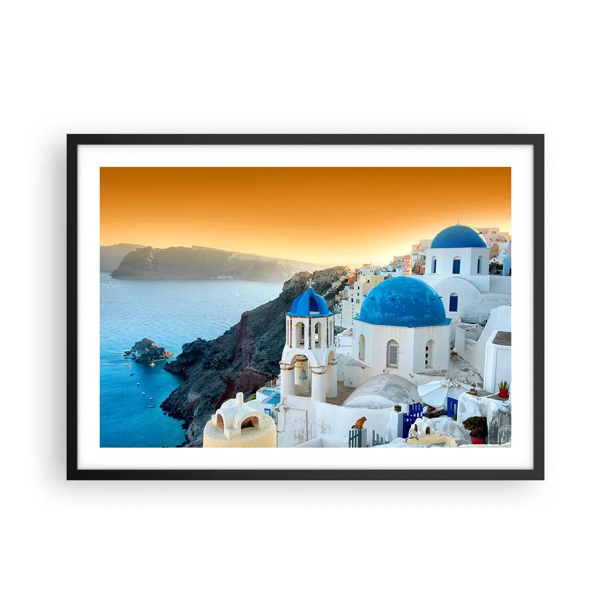 Plakát v černém rámu - Santorini - přitulené ke skalám - 70x50 cm
