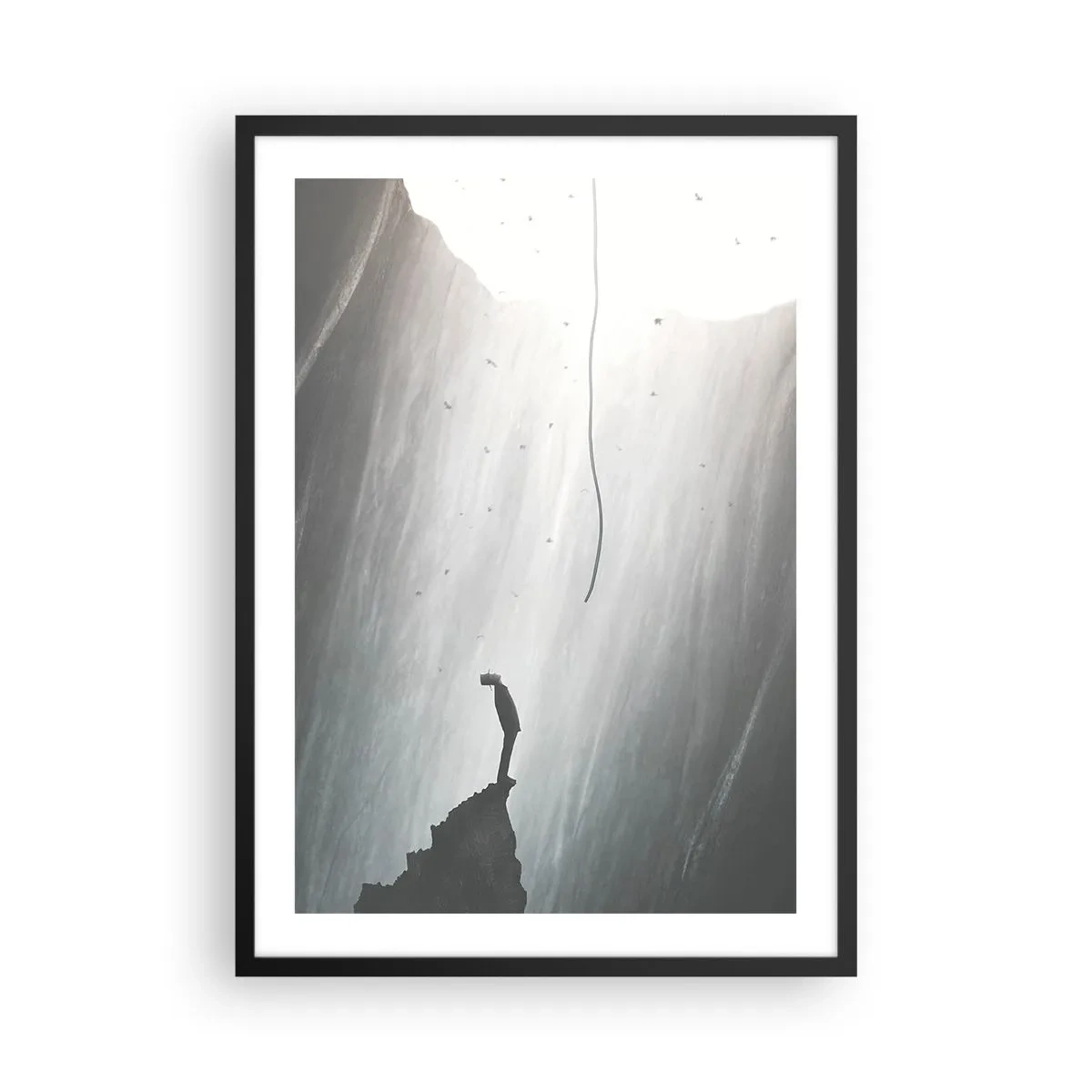 Plakát v černém rámu - Postava na okraji útesu ve světle propasti - 50x70cm - Vždycky máte na výběr - Moderní nástěnná dekorace do obývacího pokoje a ložnice ARTTOR
