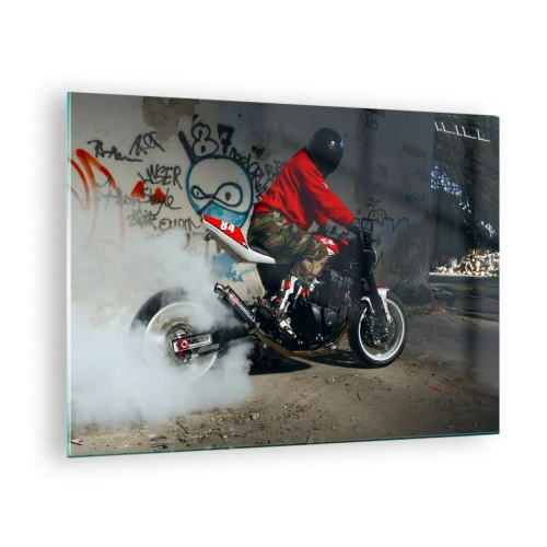 Obraz na skle - Motocyklista v akci v průmyslovém prostředí - 70x50cm - Chyť mě! - Moderní nástěnná dekorace do obývacího pokoje a ložnice ARTTOR