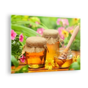 Obraz na skle - Sklenice medu na pozadí květin v zahradě - 70x50cm - Sladce a květinově - Moderní nástěnná dekorace do obývacího pokoje a ložnice ARTTOR