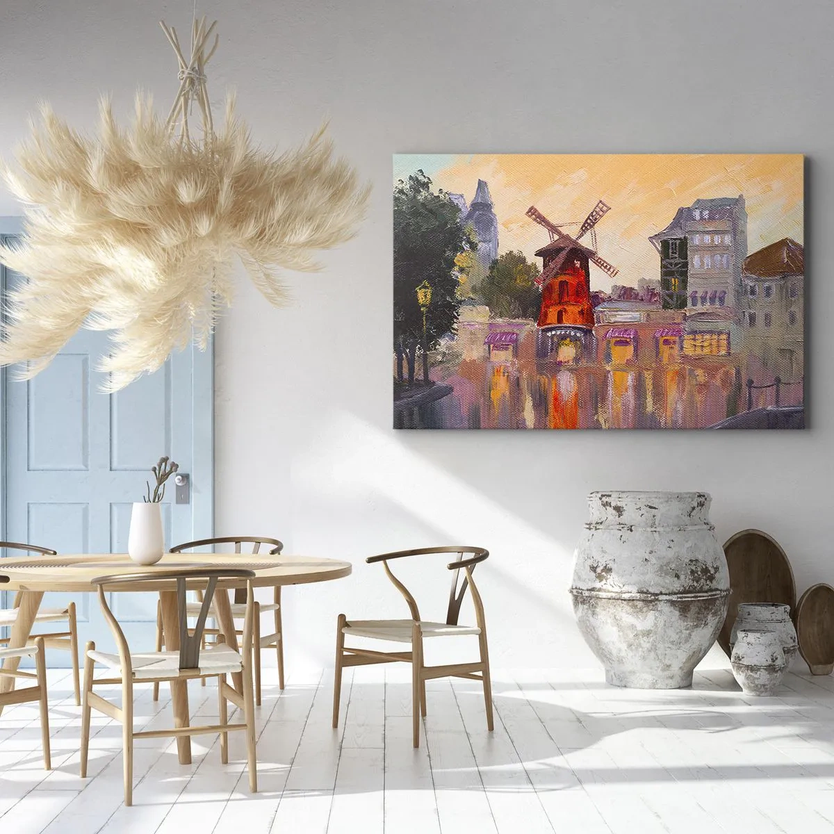 Obraz na plátně - Červený větrný mlýn Moulin Rouge obklopený městskou krajinou - 70x50cm - Pařížské ikony – Moulin Rouge - Moderní nástěnná dekorace do obývacího pokoje a ložnice ARTTOR
