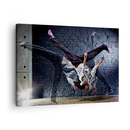 Obraz na plátně - Tanečník v dynamickém skoku proti cihlové zdi - 70x50cm - Hvězda ulice - Moderní nástěnná dekorace do obývacího pokoje a ložnice ARTTOR