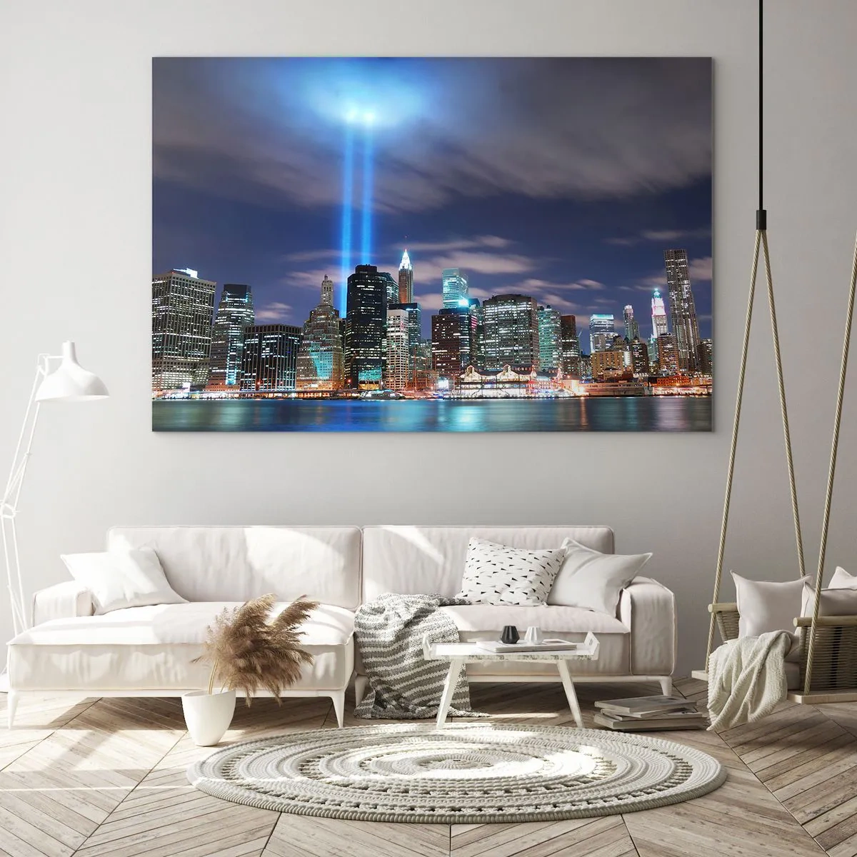 Obraz na skle - Večerní panorama města s reflektory - 70x50cm - Světlem dosáhnout nebe - Moderní nástěnná dekorace do obývacího pokoje a ložnice ARTTOR