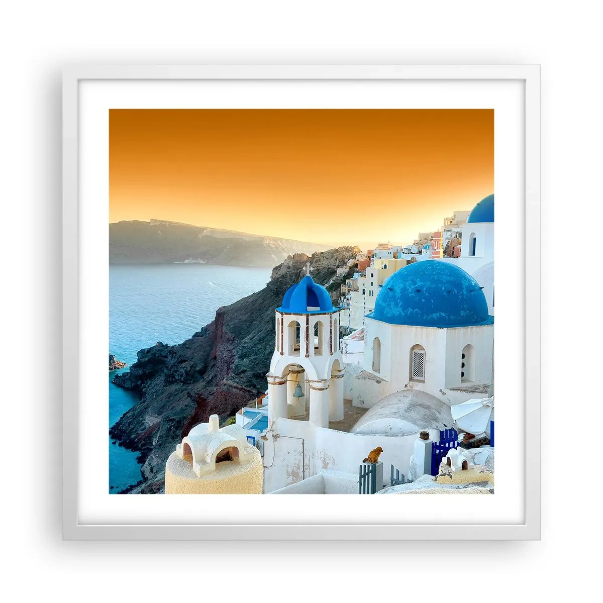 Plakát v bílém rámu - Santorini - přitulené ke skalám - 50x50 cm