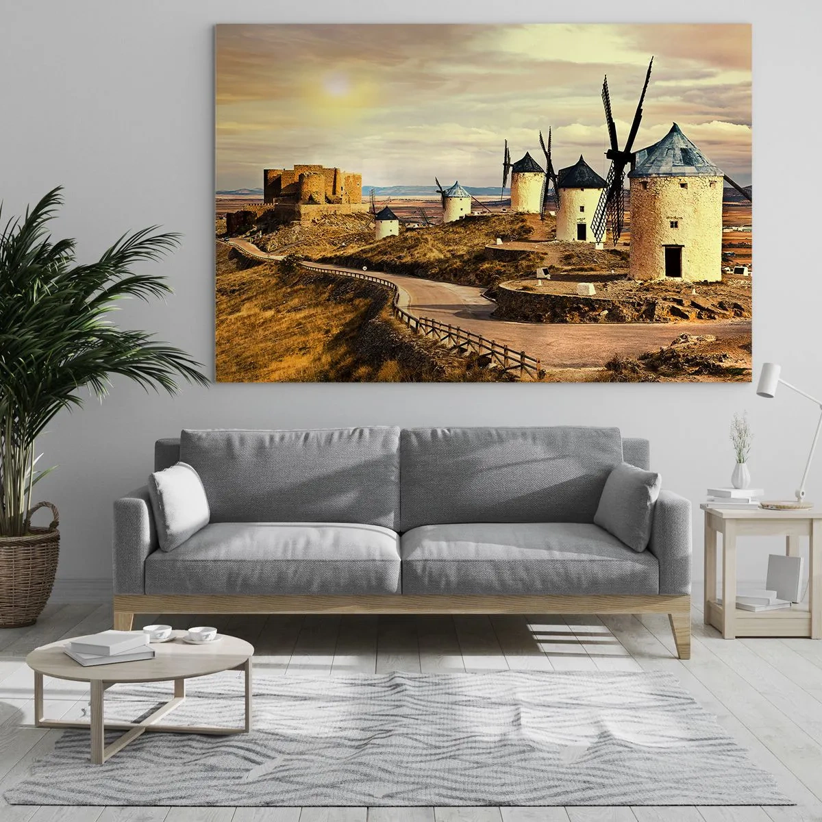 Obraz na skle - Větrné mlýny a hrad v krajině při západu slunce - 70x50cm - Brzy se objeví Don Quijote - Moderní nástěnná dekorace do obývacího pokoje a ložnice ARTTOR