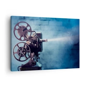 Obraz na plátně - Starý filmový projektor vrhající světlo na modrém pozadí - 70x50cm - Ve starém kině - Moderní nástěnná dekorace do obývacího pokoje a ložnice ARTTOR