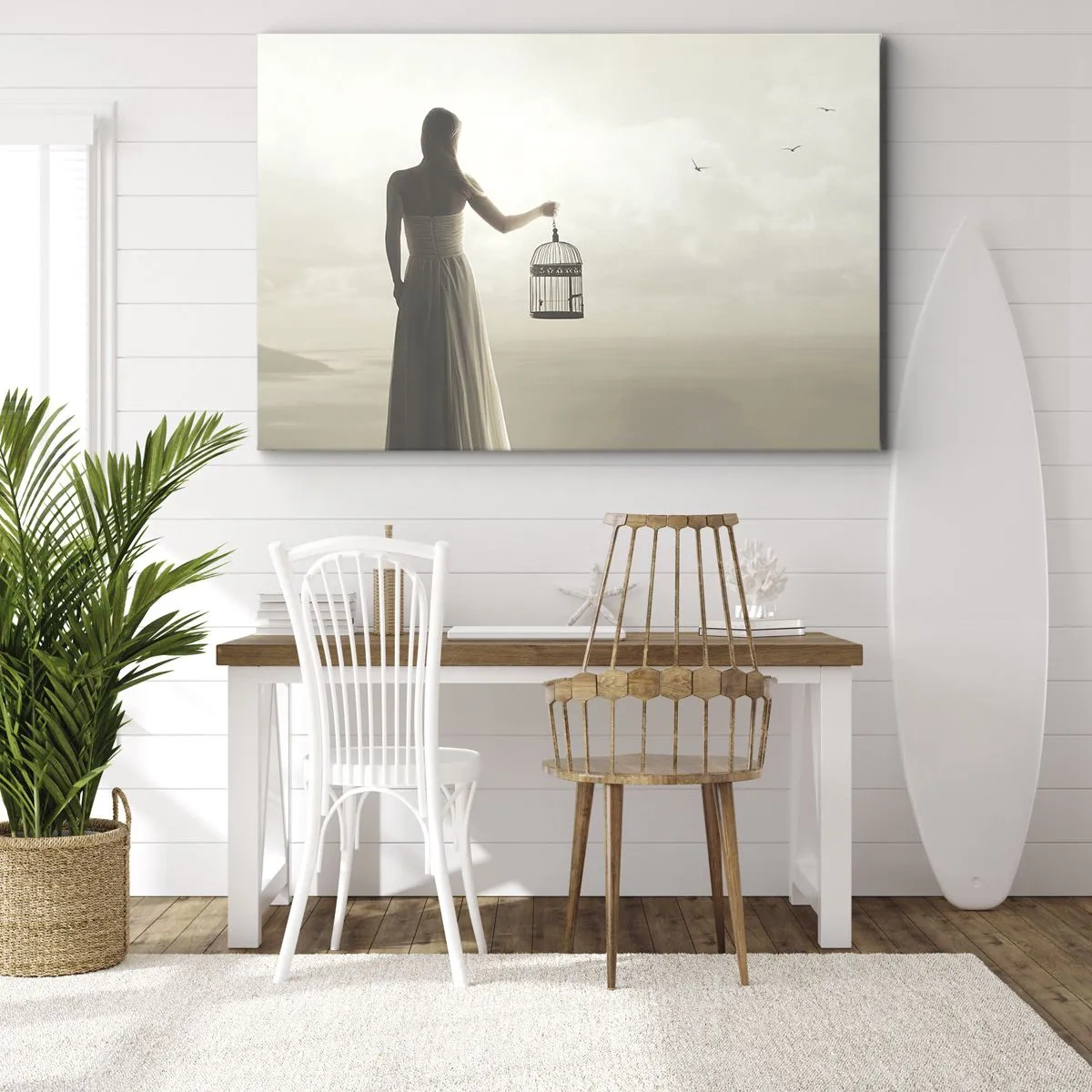 Obraz na plátně - Žena s klecí proti klidné obloze - 70x50cm - Buď svobodná - Moderní nástěnná dekorace do obývacího pokoje a ložnice ARTTOR