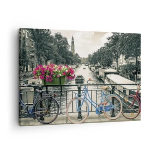 Obraz na plátně - Most s koly a květinami přes kanál v Amsterdamu - 70x50cm - Barvy  amsterdamské ulice - Moderní nástěnná dekorace do obývacího pokoje a ložnice ARTTOR