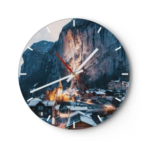 Nástěnné hodiny - Malebná vesnice na úpatí zasněžených hor ozářená teplým světlem - 30x30cm - Světlý duch zimy - Moderní nástěnná dekorace do obývacího pokoje, kuchyně a ložnice ARTTOR