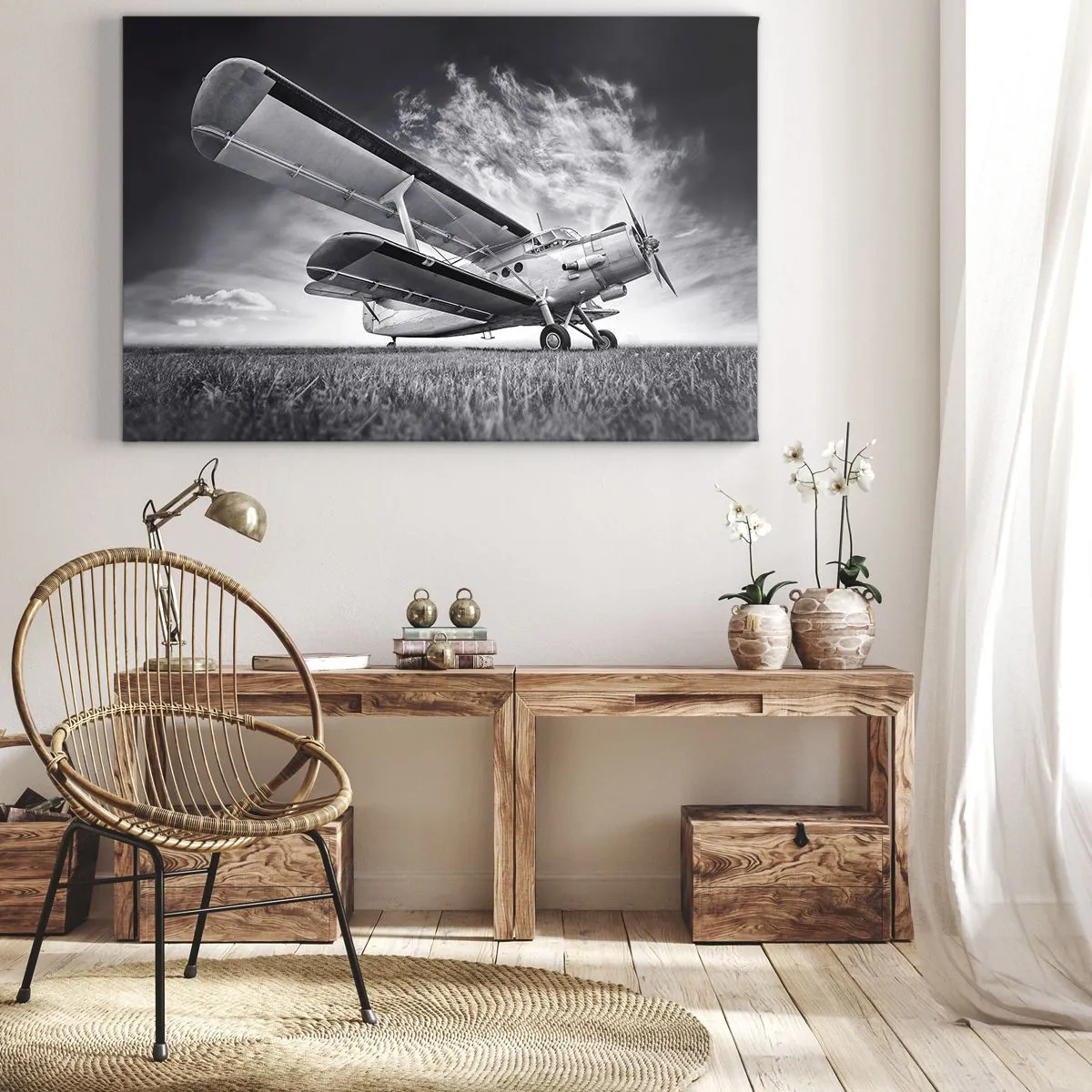 Obraz na plátně - Letadlo proti dramatické obloze v černé a bílé - 70x50cm - Okřídlený poutník - Moderní nástěnná dekorace do obývacího pokoje a ložnice ARTTOR
