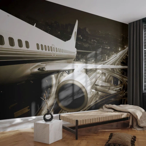 Fototapeta Standard Eco - Letadlo nad nočním městem se sítí dálnic - 100x70cm - Letět do noci - Moderní nástěnná dekorace do obývacího pokoje a ložnice ARTTOR