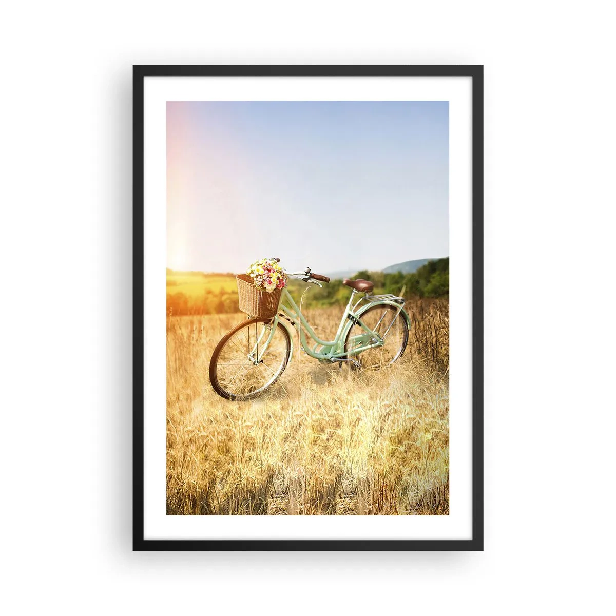 Plakát v černém rámu - Kolo s košíkem plným květin na louce - 50x70cm - Chvíli tu zůstanu - Moderní nástěnná dekorace do obývacího pokoje a ložnice ARTTOR