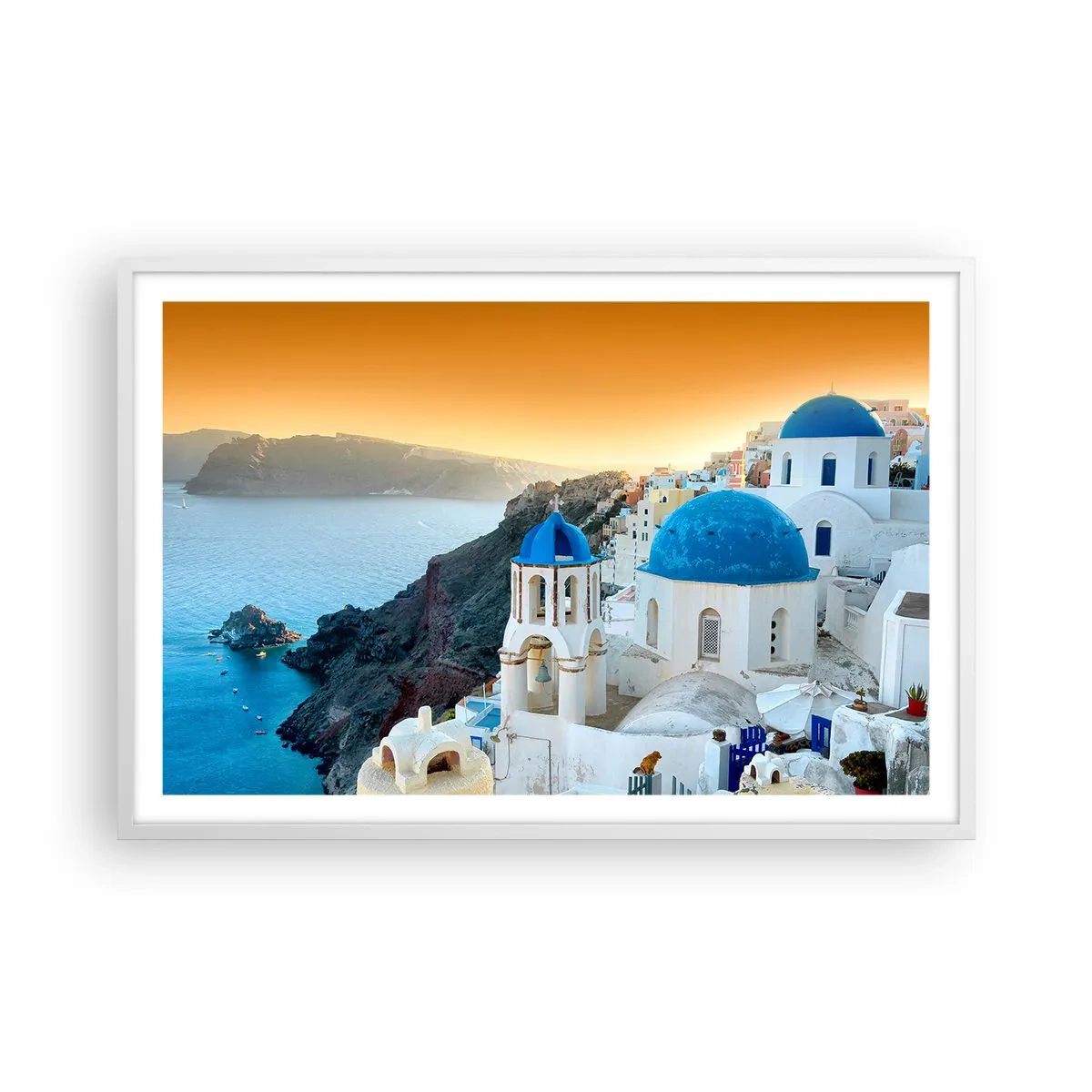 Plakát v bílém rámu - Santorini - přitulené ke skalám - 91x61 cm