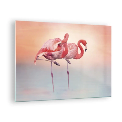 Obraz na skle - Dva plameňáci stojící ve vodě s pastelovým pozadím západu slunce - 70x50cm - V barvě zapadajícího slunce - Moderní nástěnná dekorace do obývacího pokoje a ložnice ARTTOR