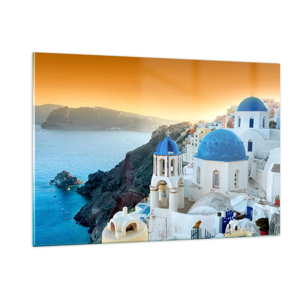 Obraz na skle - Santorini - přitulené ke skalám - 120x80 cm