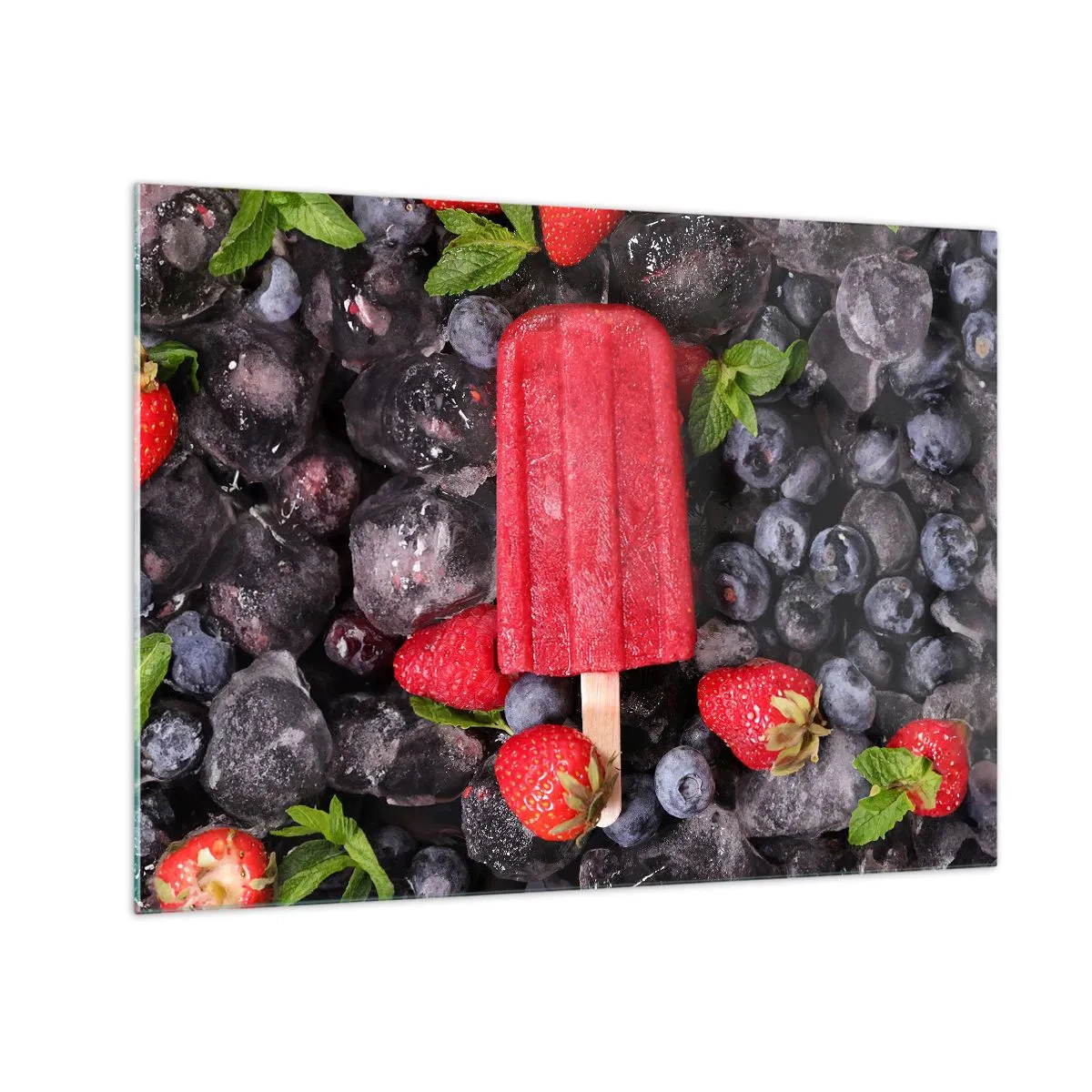 Obraz na skle - Ledová tyčinka mezi zmrazeným ovocem a lístky máty - 70x50cm - Chuť horkého léta - Moderní nástěnná dekorace do obývacího pokoje a ložnice ARTTOR