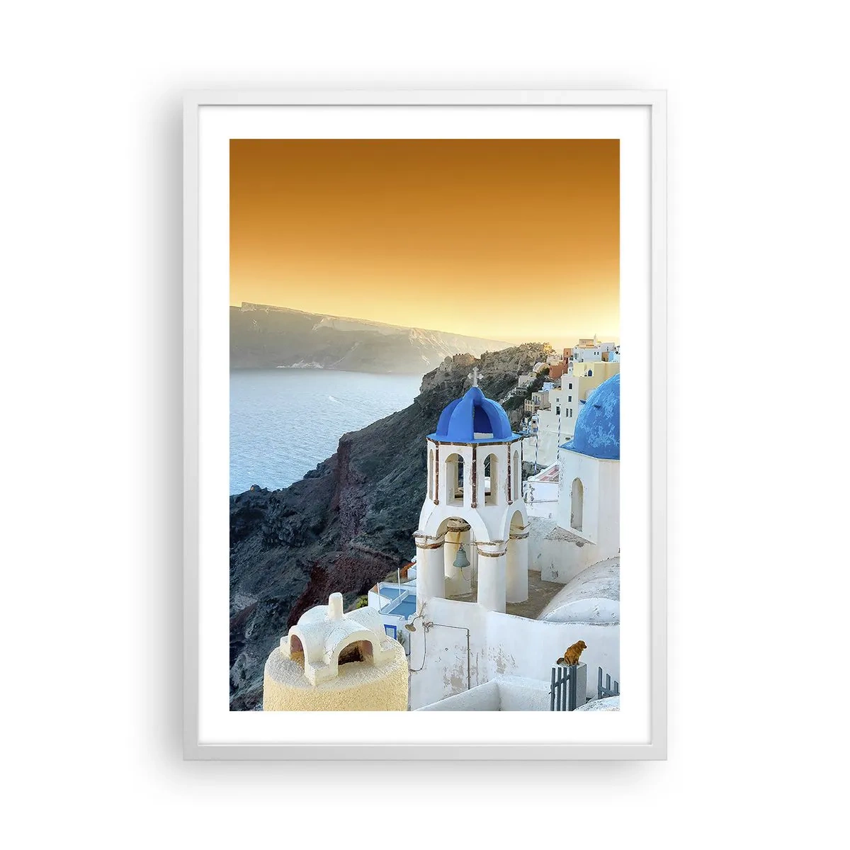 Plakát v bílém rámu - Santorini - přitulené ke skalám - 50x70 cm